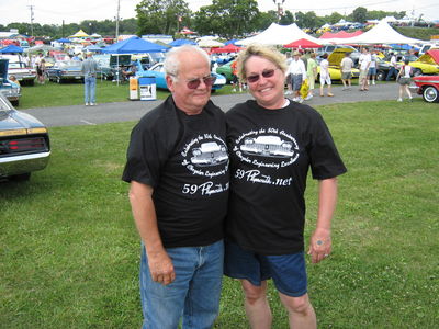 Jim and Irene wearing their 59Plymouth shirts
