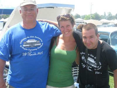Where is John's hand and why is she smiling? 
