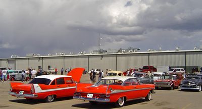 At the first car show
I've not driven it very much since purchasing the 59 Sport Fury, because of the usual work and money problems, but have recently spent more time and money (brake repairs) on the car prepping for more car shows this summer (2011).  The car is completely stock with the Poly 318, 4 bbl and "juke box" push button Torqueflite 3 spd transmission.  It came with 1958 hubcaps, but I have since purchased the correct 1959 hubcaps.  
