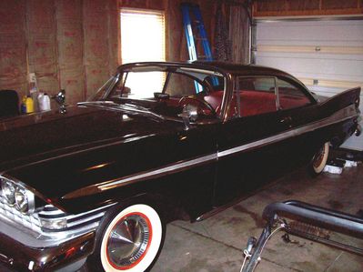 The black beauty
The car's previous owner was Gino's father in law who passed away. Gino is planning on re-doing the upholstery abd otherwise the car is fine.
